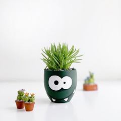   گلدان سفالی طرح om Nom (شخصیت بازی cut the Rope)